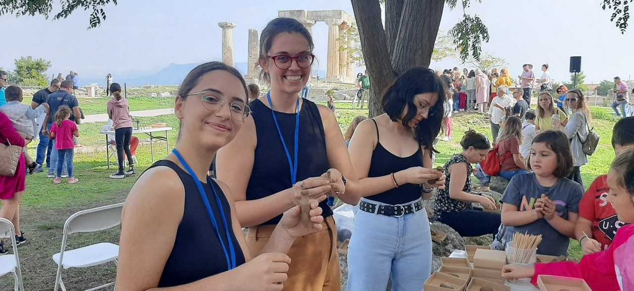 Melina Theodosiou (volunteer, front) and Taylor Cwikla (middle) during International Archaeology Day celebrations on site in October 2023.